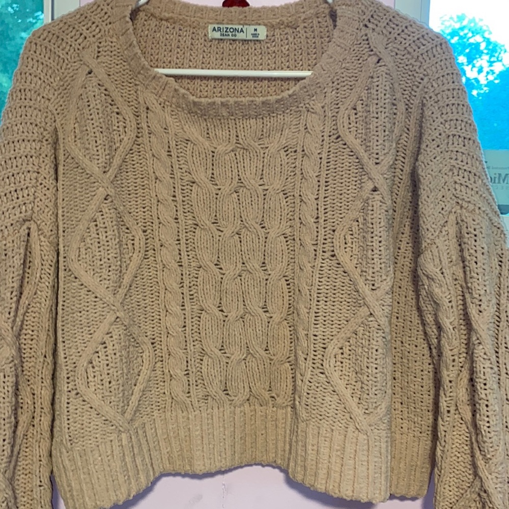 Light pink cropped knit sweater, cute, looks great with skirts.